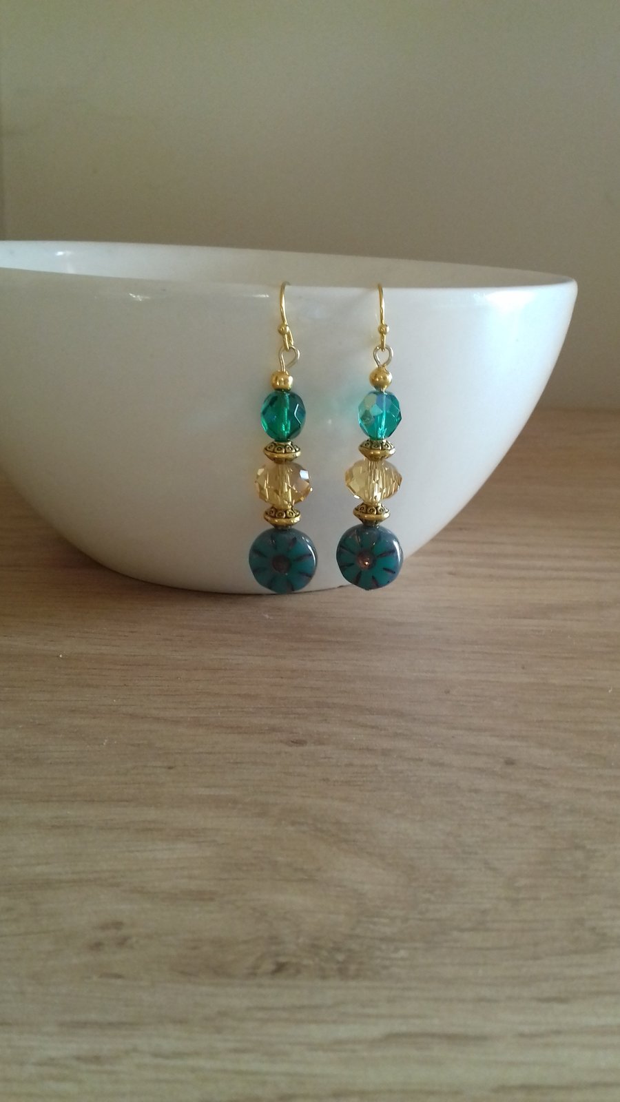 TEAL AND GOLD FLOWER GLASS BEAD EARRINGS.
