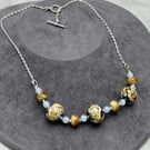 Raku spotted lampwork glass beaded necklace cream brown blue caramel