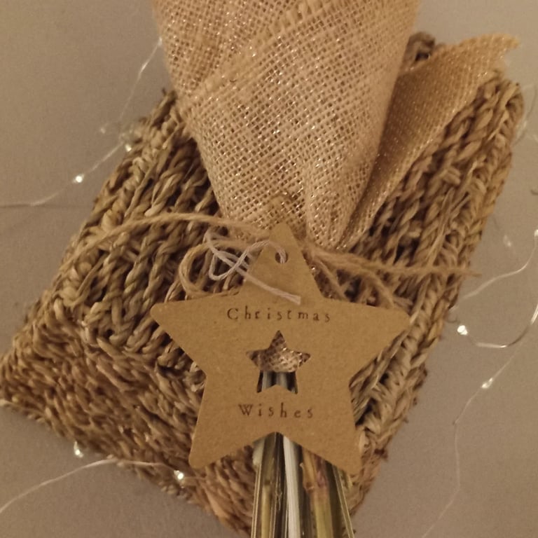 Medium-sized dried flower bouquet tied and wrapped in a sparkle hessian wrap.