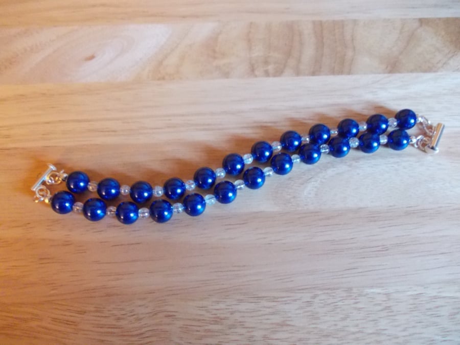 Blue shell and quartz two strand bracelet