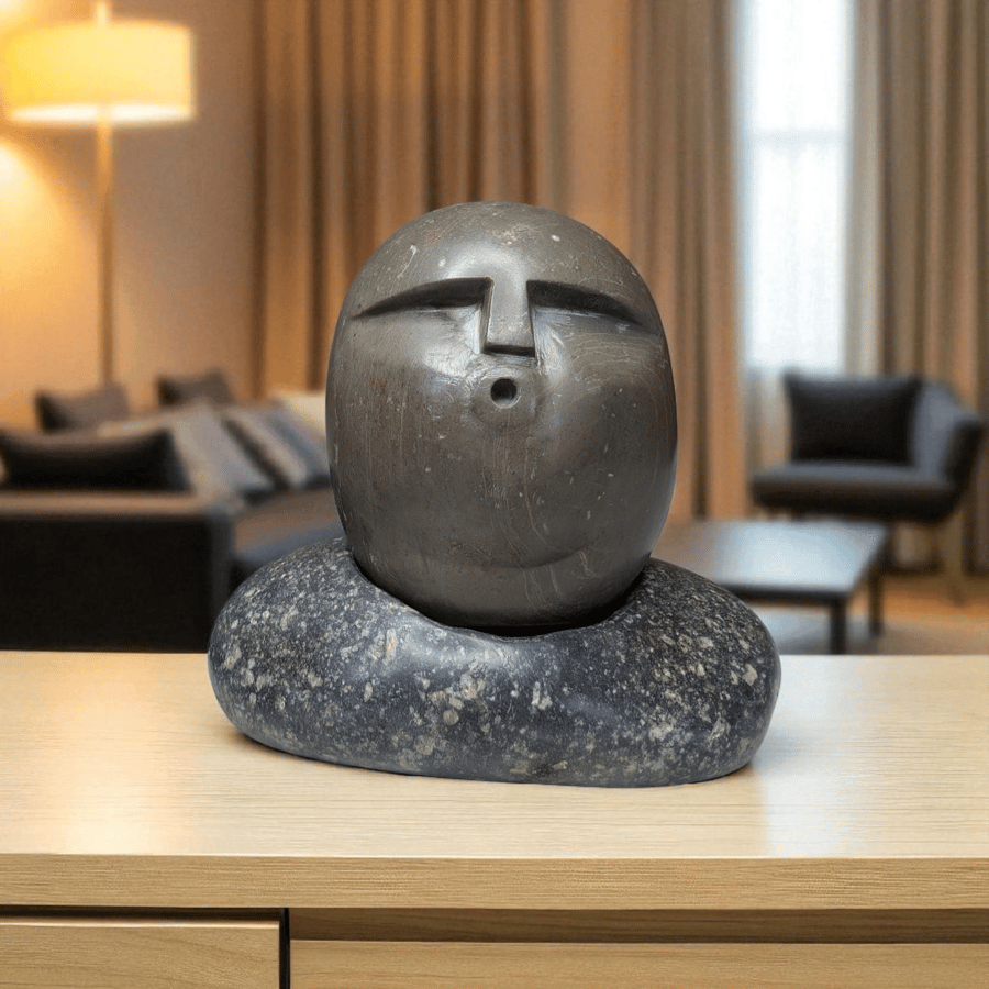 Stone Face Ooof Sculpture on plinth, Baby Ooof, hand carved.