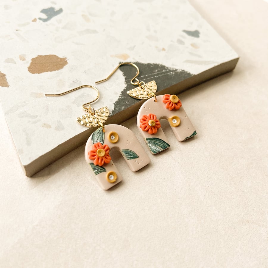 Floral drop earrings in nude