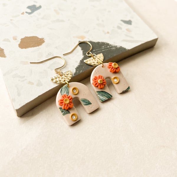 Floral drop earrings in nude