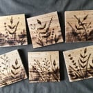 Wooden pyrography designed coasters