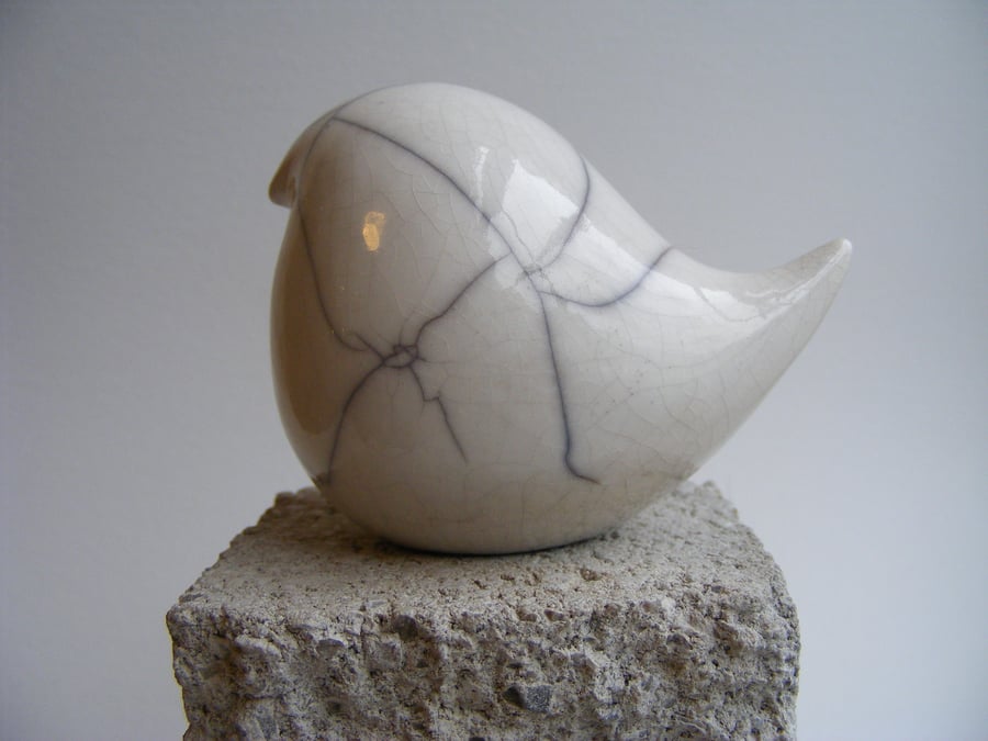 Raku glazed round bird