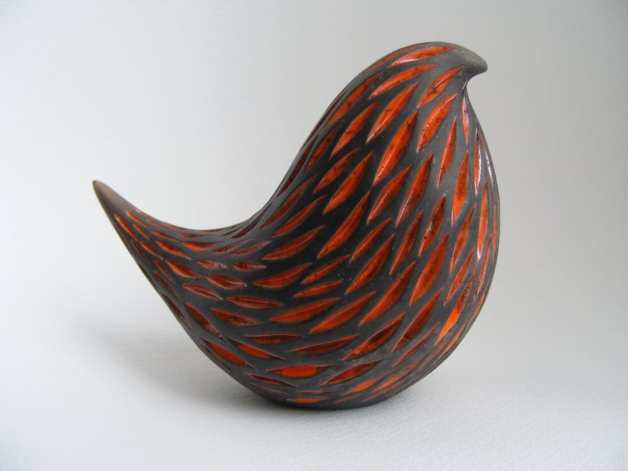 Carved and raku fired bird, orange (D)