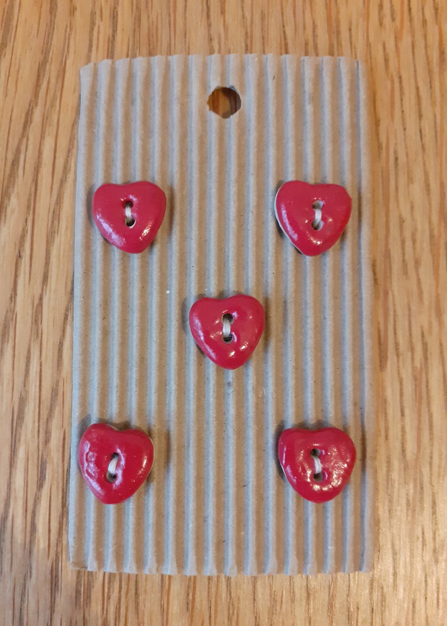 Cute little red ceramic heart buttons