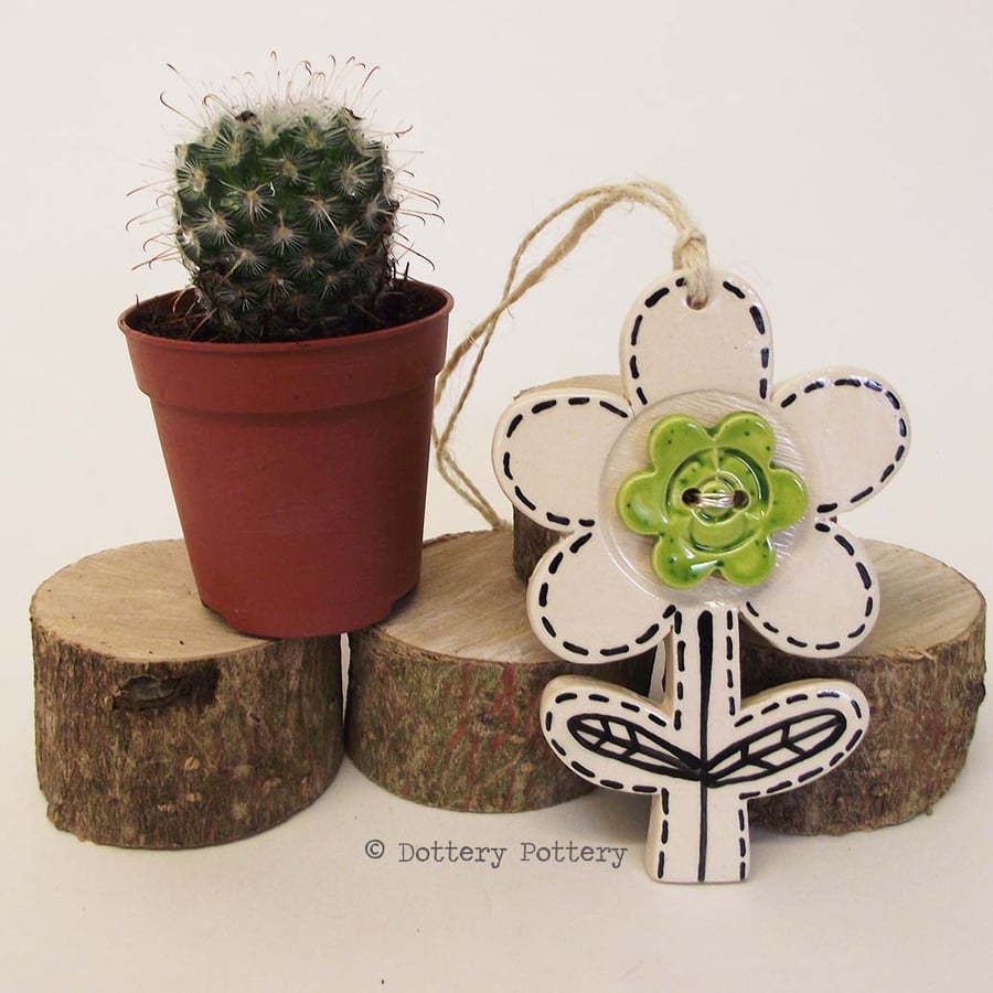 Pottery Flower Ceramic hanging decoration. Illustrated Flower pottery decoration