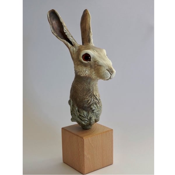 Unique hand crafted Sculpture of a Hare fixed on a wooden plinth