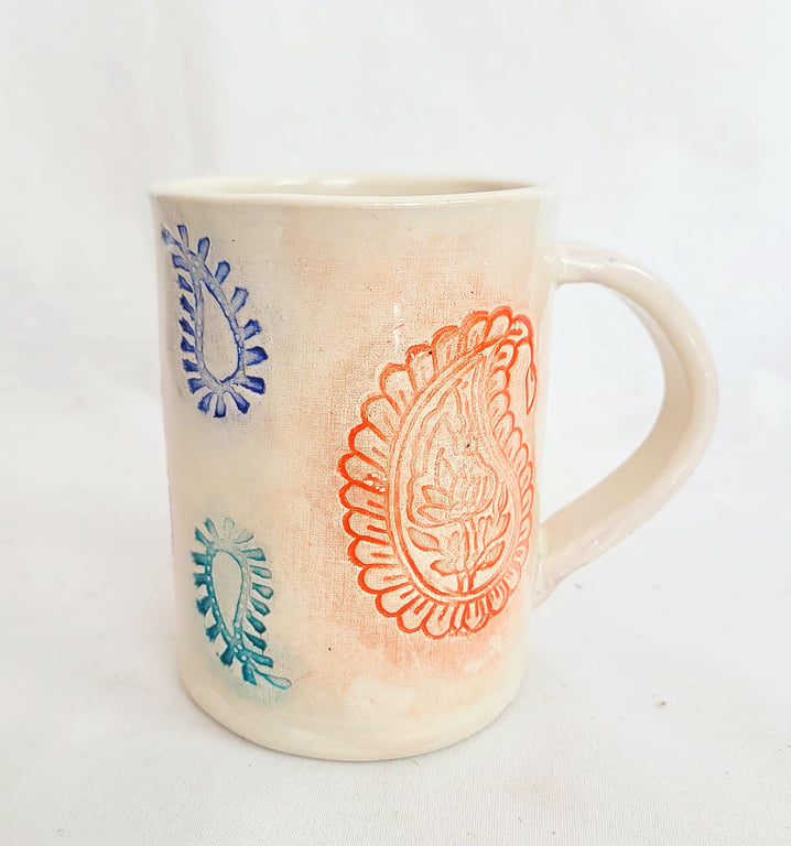 Handmade Paisley Stamped Pottery Mug: Pink, Orange, Blue, and Teal