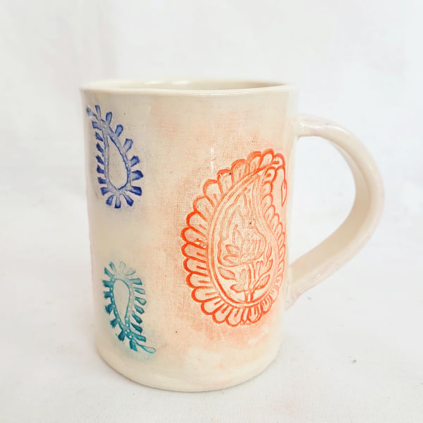 Handmade Paisley Stamped Pottery Mug: Pink, Orange, Blue, and Teal