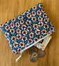 Small zipped fabric coin purse, pouch, in bright daisy pattern