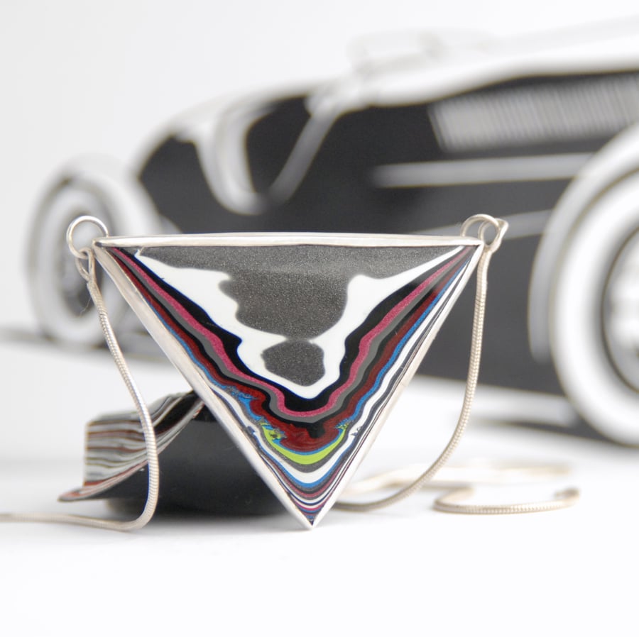 Triangular Jeep fordite pendant 