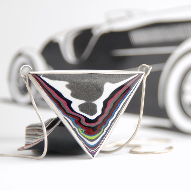 Triangular Jeep fordite pendant 