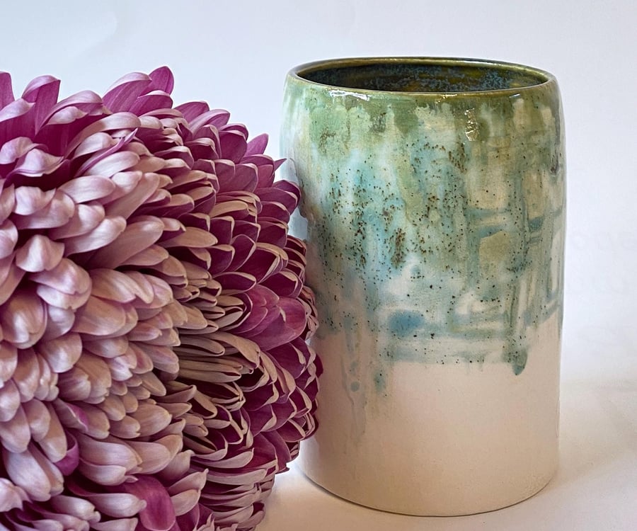 Hand-made ceramic vase, glazed by hand in dark green with hints of turquoise