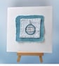Hand embroidered Christmas card with a shiny blue and silver beaded bauble