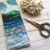 Embroidered seascape bookmark.