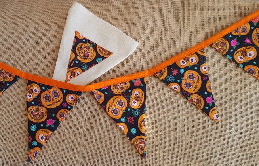 Reusable pumpkin Halloween bunting in a bag. 