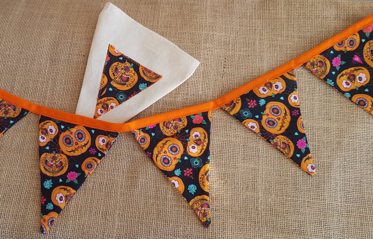 Reusable pumpkin Halloween bunting in a bag. 