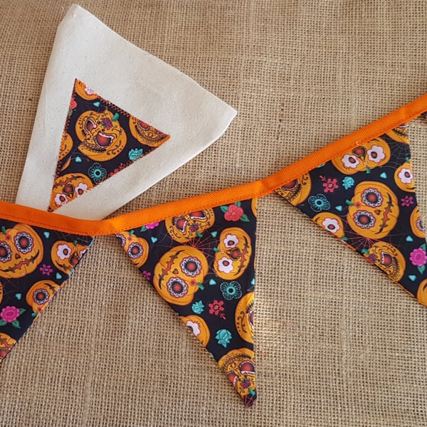 Reusable pumpkin Halloween bunting in a bag. 