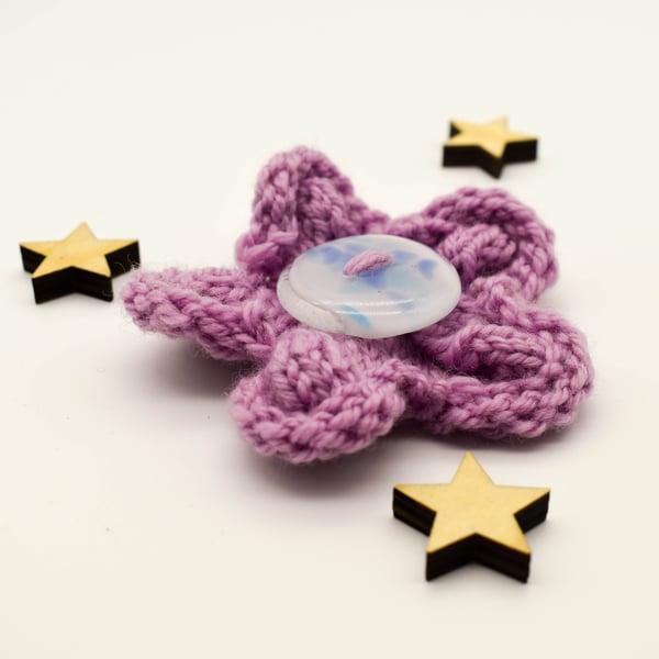 Hand knitted pink flower brooch pin with fused glass button