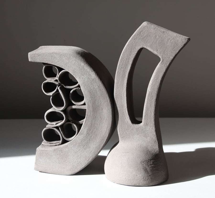 Black Clay Sculpture Interdependent Forms