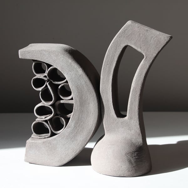Black Clay Sculpture Interdependent Forms