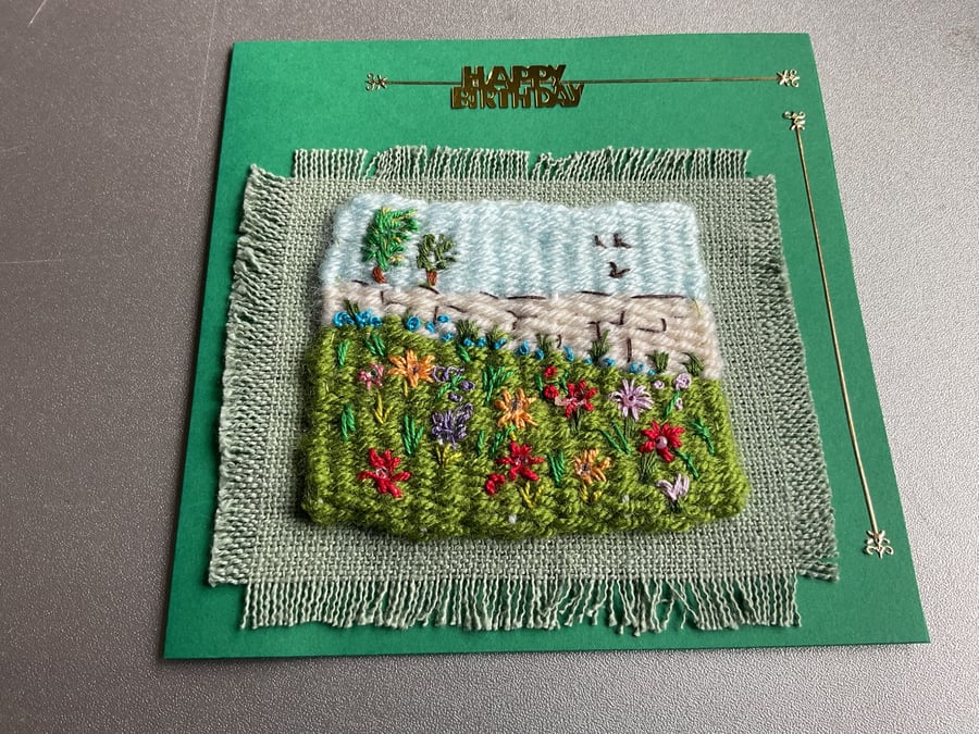  A woven birthday card with embroidered flowers 