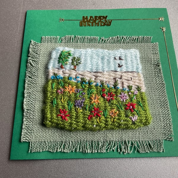  A woven birthday card with embroidered flowers 