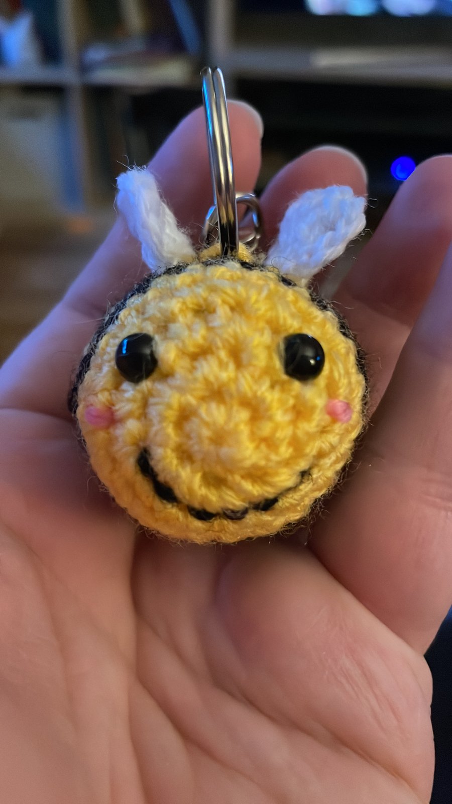Crocheted bumblebee key ring. 