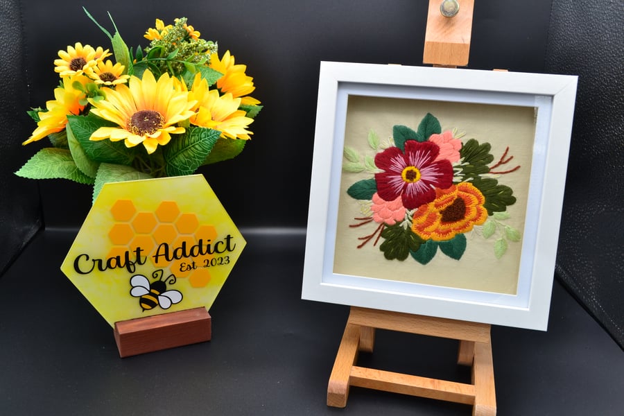 Framed hand stitched artwork