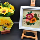 Framed hand stitched artwork