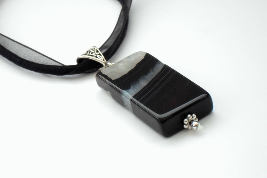 Black and white banded agate pendant necklace, with ribbon hanging