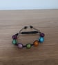BLACK AND MULTI COLOURED MACRAME BRACELET. - Image 3