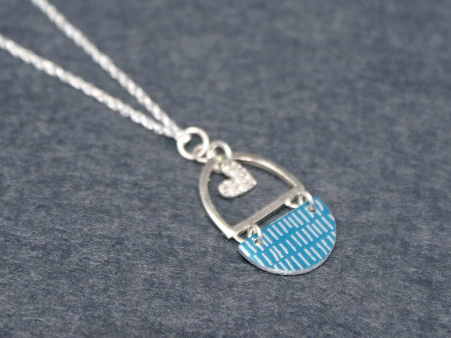Blue and silver heart pendant