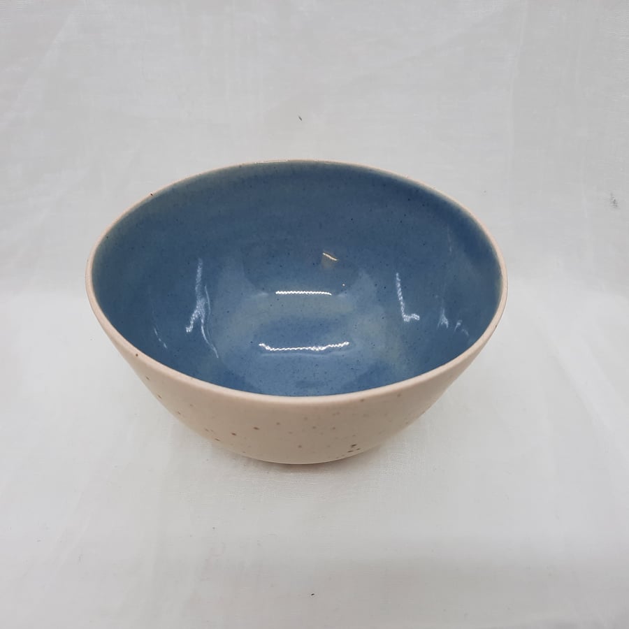 Blue and cream speckle ceramic bowl