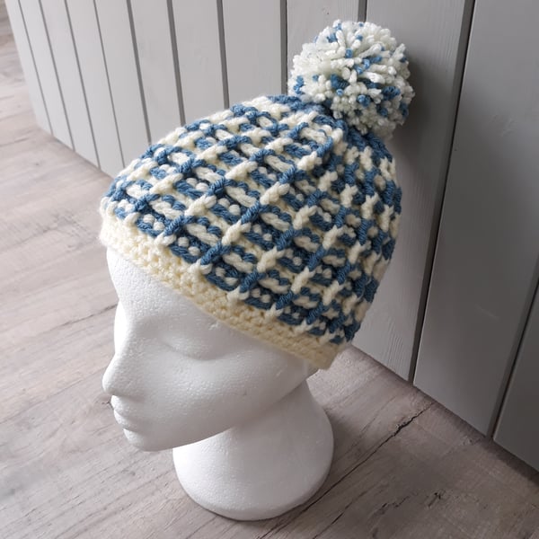 Blue and cream crochet pompom hat