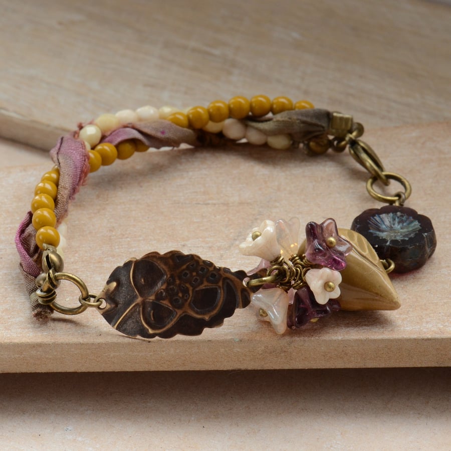 Mustard Ceramic Bird, Vintaj Embossed Leaf, Czech Flowers & Sari Silk Bracelet