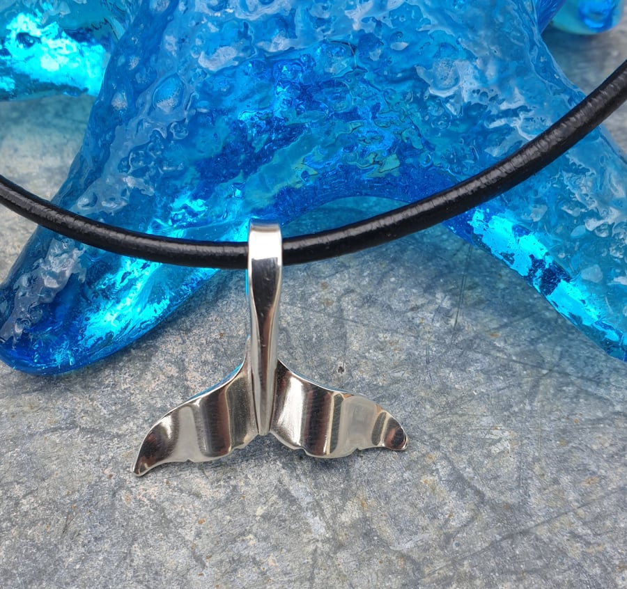 Silver whale tail pendant