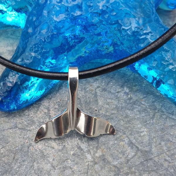 Silver whale tail pendant