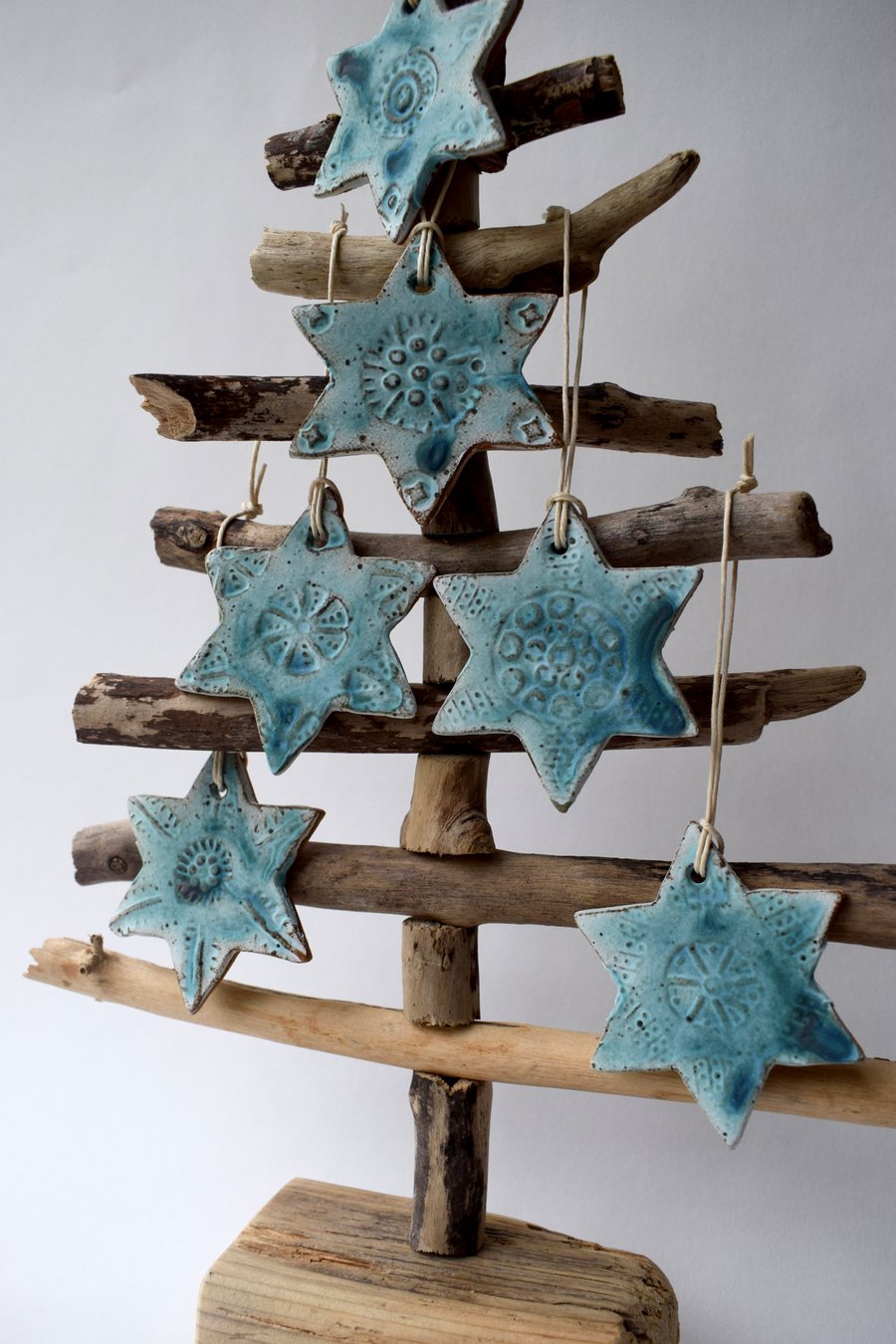 Set of Six Turquoise Ceramic Stars