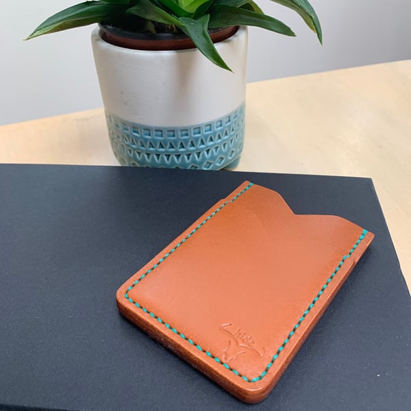 Leather card holder wallet in tan with three slots 