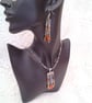 Cone Beads and Crystal Pendant on a Crystal Necklace with Matching Earrings