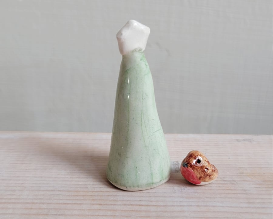 Miniature ceramic robin sculpture with Christmas tree, cake toppers or ornament 