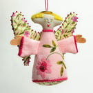 Pale pink hanging angel with hand embroidered marigold