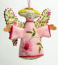 Pale pink hanging angel with hand embroidered marigold