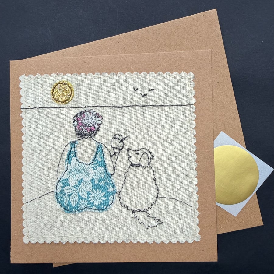a lady and her dog on the beach free motion appliqué blank greetings card