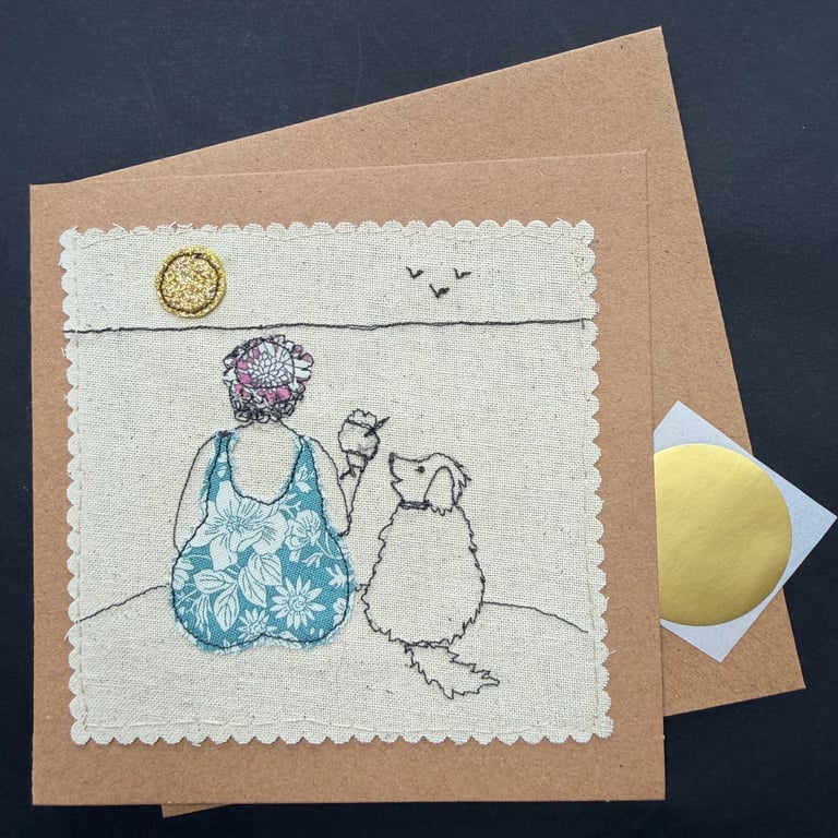 a lady and her dog on the beach free motion appliqué blank greetings card