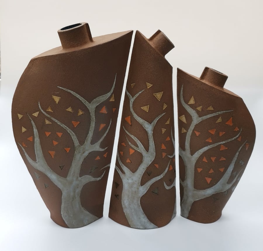 Trio of "autumn scenes' vases