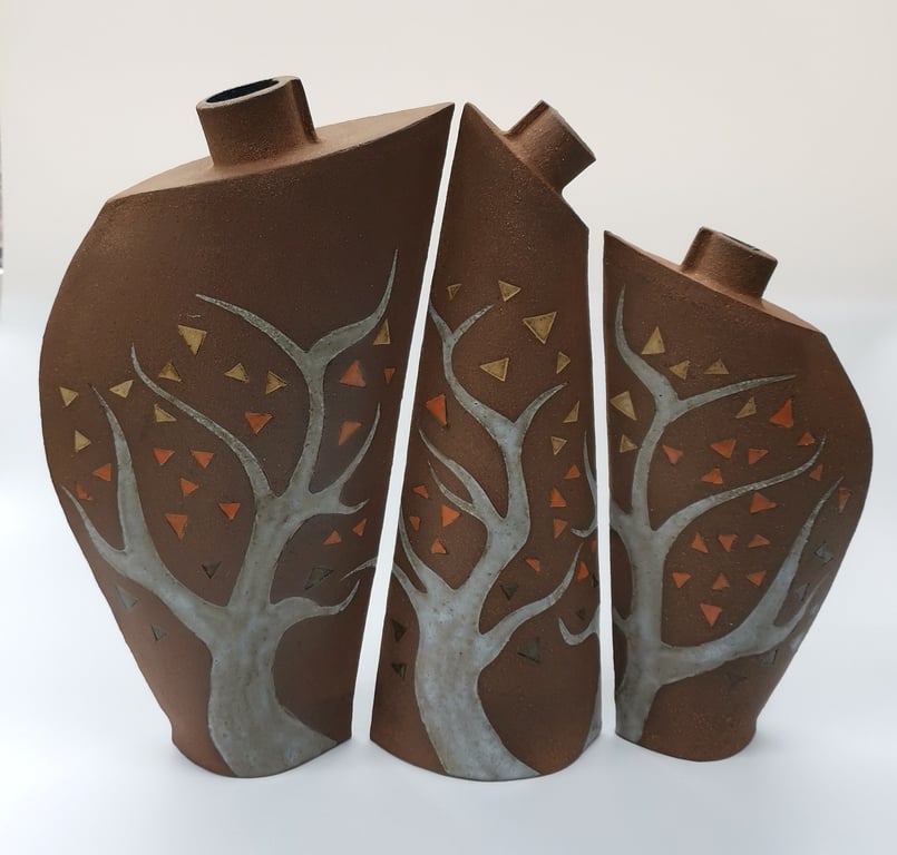 Trio of "autumn scenes' vases